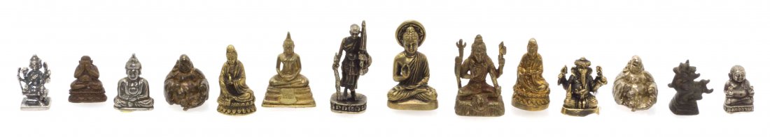 A Group of Twelve Asian Metal Figures of Deities,: A Group of Twelve Asian Metal Figures of Deities, together with an opium weight and a figure of Gandhi. Height of tallest 1 1/8 inches. The Adell Venus Collection of Miniatures Property from the Estat