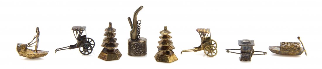 Eight Asian Silver Articles, Height of tallest 1 1/16: Eight Asian Silver Articles, comprising two rickshaws, two pagodas, a junk boat, a river boat, a pipe, and a carriage. Height of tallest 1 1/16 inches. The Adell Venus Collection of Miniatures Propert