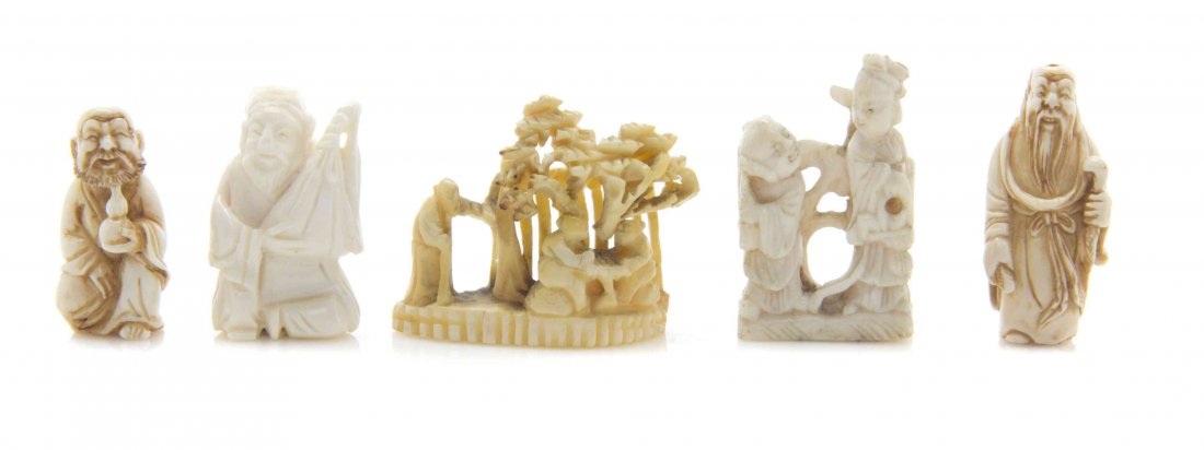 A Group of Five Carved Ivory Articles, Height of: A Group of Five Carved Ivory Articles, comprising two figural ojime, a figural composition of a man and child, and other examples. Height of tallest 1 1/8 inches. The Adell Venus Collection of Miniatu