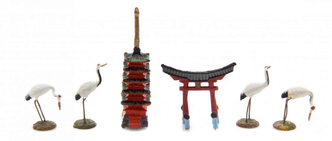 Two Japanese Models of Buildings, Height of tallest 1: Two Japanese Models of Buildings, comprising a pagoda and a temple gate, together with four figures of cranes. Height of tallest 1 5/8 inches. The Adell Venus Collection of Miniatures Property from th