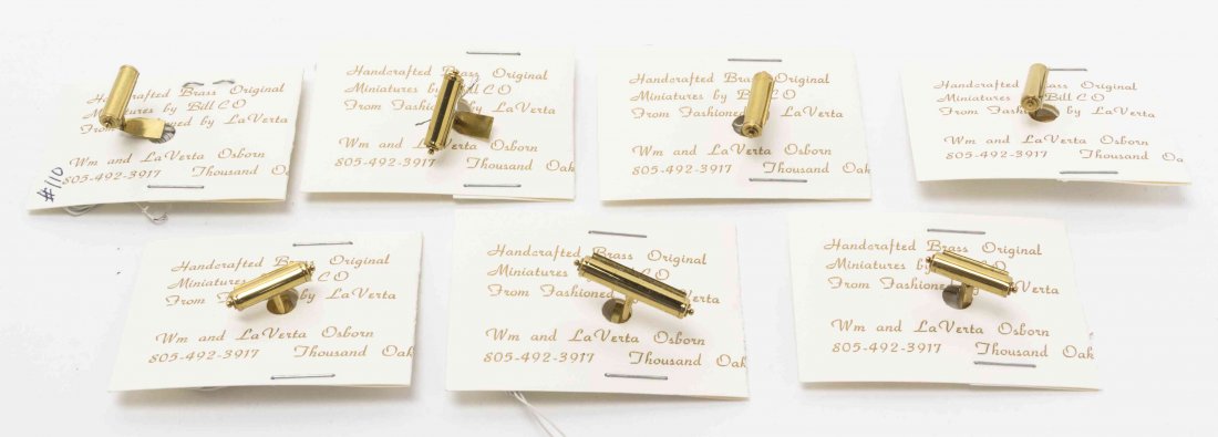 A Group of Seven Brass Picture Lights, BillCo, Width of: A Group of Seven Brass Picture Lights, BillCo, of various sizes, each in the original box with instructions. Width of widest 1 inch. The Adell Venus Collection of Miniatures Property from the Estate o