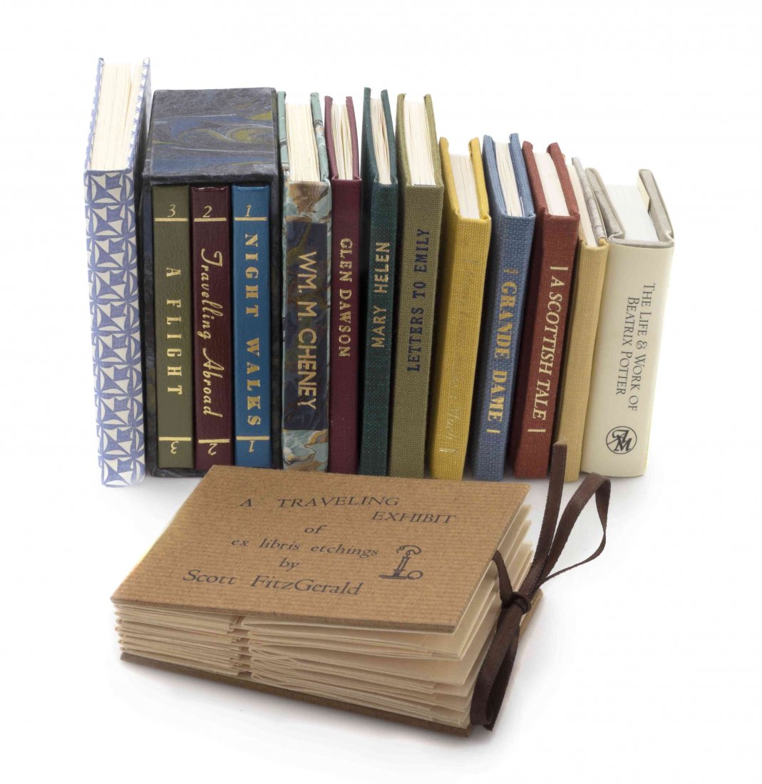 A Group of Fourteen Small Books, 20th Century,: A Group of Fourteen Small Books, 20th Century, bound in decorative boards and cloth. Dimensions of largest 3 x 3 inches. The Adell Venus Collection of Miniatures Property from the Estate of Adell Venu
