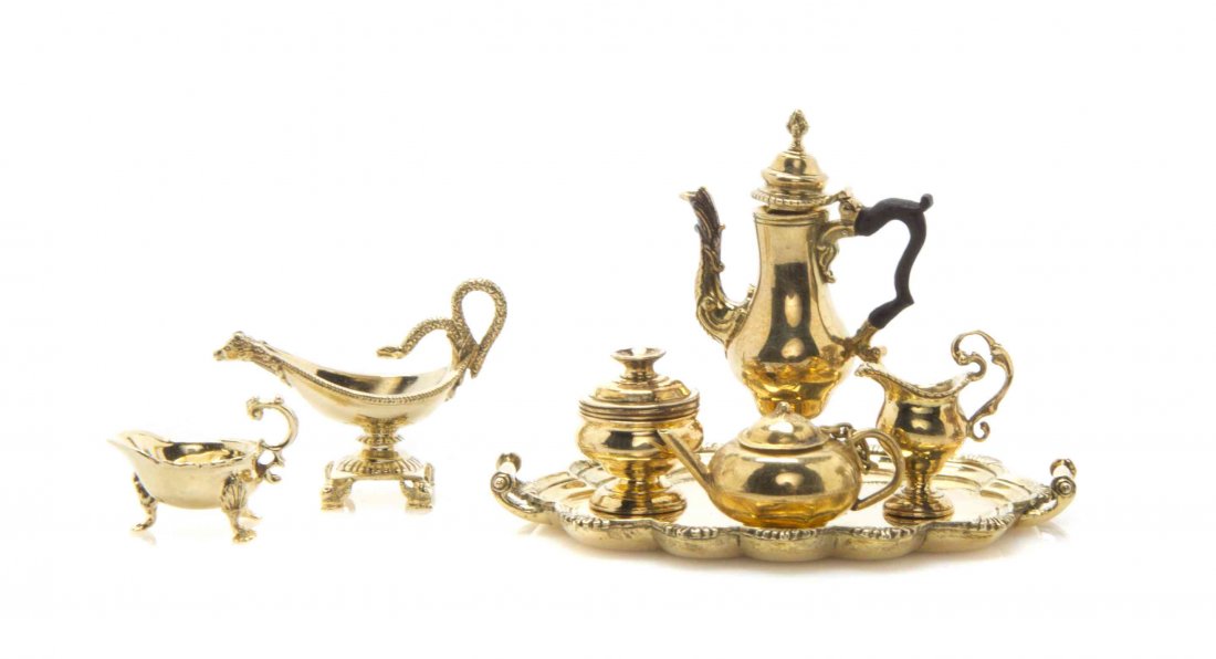 A Set of 18 Karat Yellow Gold Table Articles based on: A Set of 18 Karat Yellow Gold Table Articles based on American Colonial and Federal examples, Peter Acquisto, comprising a three-piece coffee service and tray, by Obadiah Fisher, after a circa 1780 ex