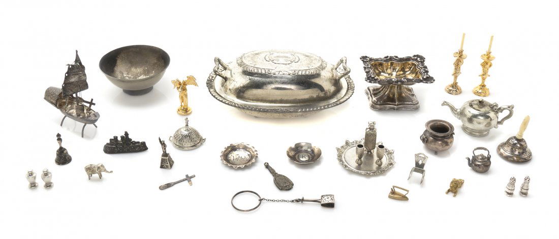 A Group of Silver and Silverplated Table Articles,: A Group of Silver and Silverplated Table Articles, comprising a covered entree dish, footed bowl, cache pot, two ships, two circular dishes, two bells, two trivets, four casters, two circular trays, t