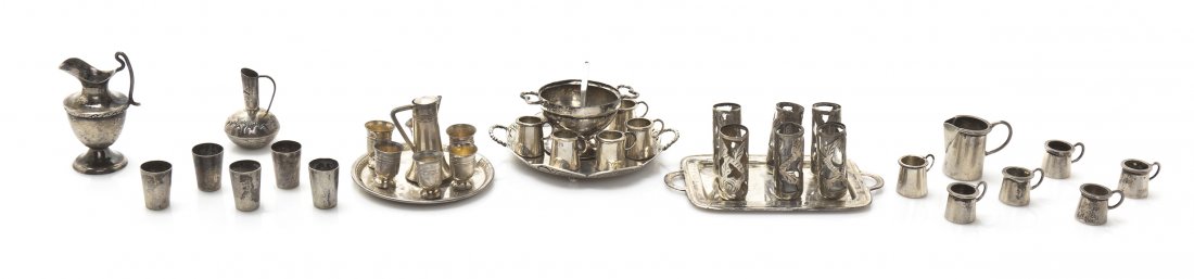 A Group of Silver and Silverplated Drinking Articles,: A Group of Silver and Silverplated Drinking Articles, comprising a rectangular tray with five matching glasses, circular tray with a pitcher and six matching beakers, punch bowl and ladle, circular tr