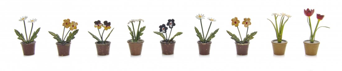 A Collection of Nine Austrian Cold Painted Bronze: A Collection of Nine Austrian Cold Painted Bronze Potted Plants, each depicting various flower species. Height of tallest 1 5/8 inches. The Adell Venus Collection of Miniatures Property from the Estat