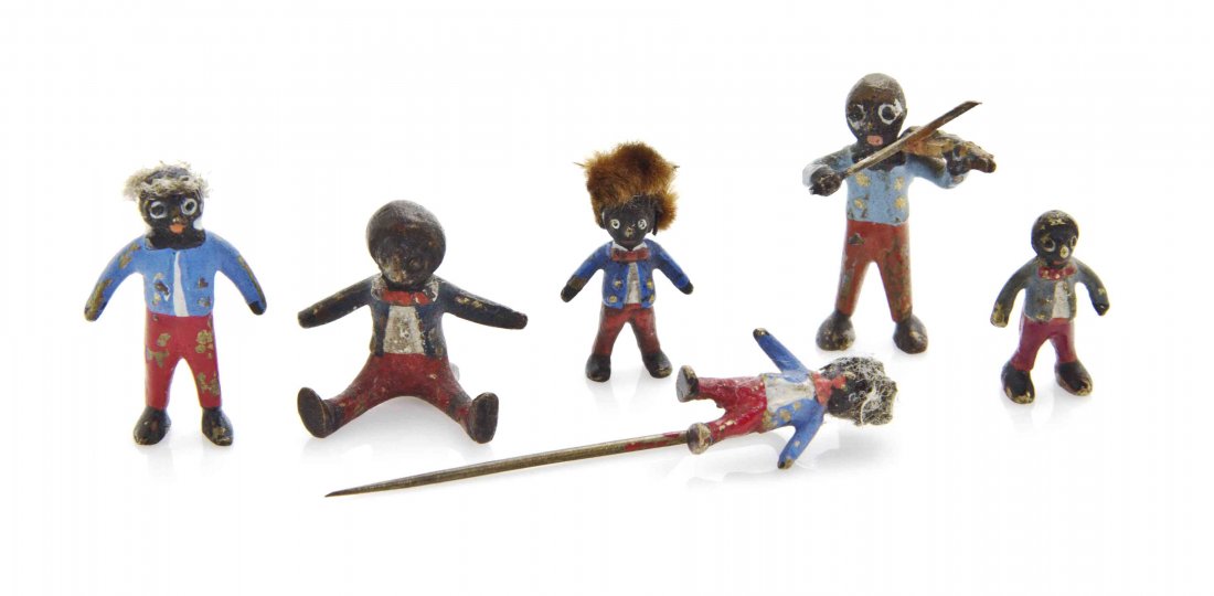 Six Austrian Cold Painted Miniature Bronze Figures,: Six Austrian Cold Painted Miniature Bronze Figures, depicting golliwogs in various poses, including a stickpin example. Length of longest overall 1 5/8 inches. The Adell Venus Collection of Miniatures