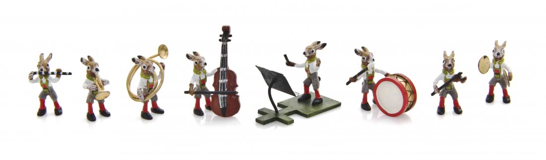 A Set of Austrian Cold Painted Miniature Bronze Band: A Set of Austrian Cold Painted Miniature Bronze Band Figures, each depicting a rabbit wearing lederhosen, including a conductor and seven musicians. Length of longest 1 1/4 inches. The Adell Venus Col
