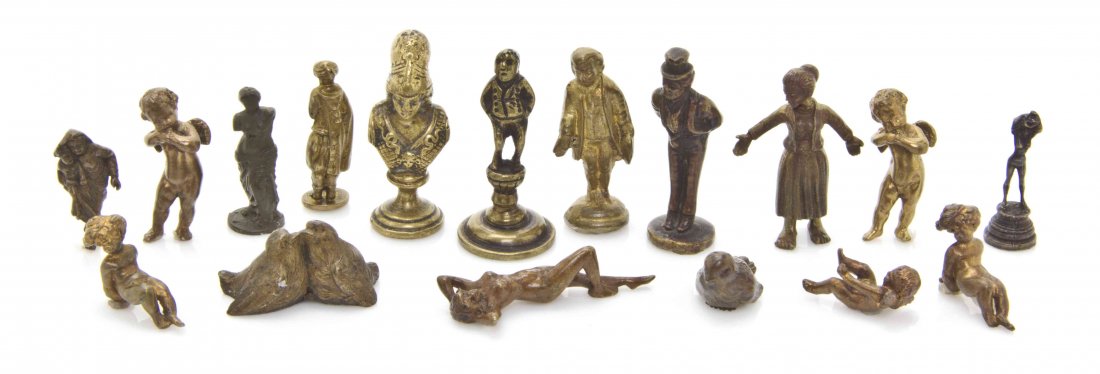 A Collection of Seventeen Bronze and Bronzed Metal: A Collection of Seventeen Bronze and Bronzed Metal Figures, comprising seals, nude maidens, putti, birds and others. Height of tallest 1 5/8 inches. The Adell Venus Collection of Miniatures Property f