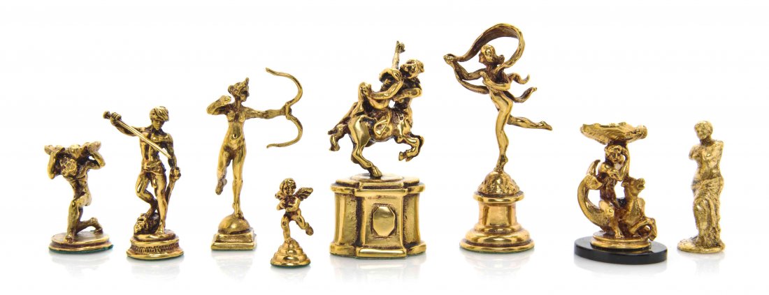 A Collection of Gilt Metal Figural Groups, Height of: A Collection of Gilt Metal Figural Groups, including figures after the antique rape of Deianira, Diana the huntress, and Venus de Milo, turbaned male drawing a sword, winged putto, scarf dancer, and t
