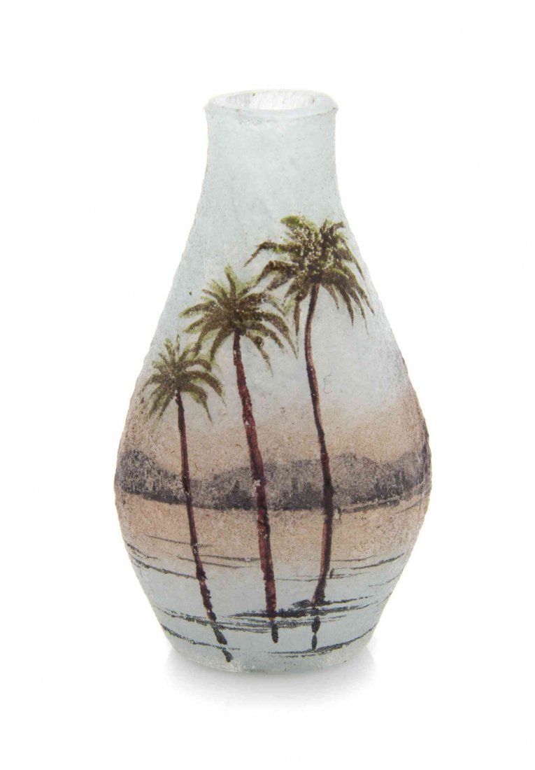 A Daum Miniature Cameo Glass Vase, Height 1 9/16: A Daum Miniature Cameo Glass Vase, in the Nil pattern, of bottle form decorated with a continuous landscape of the Nile depicting palm trees and temples, signed to base Daum Nancy with the Cross of Lo