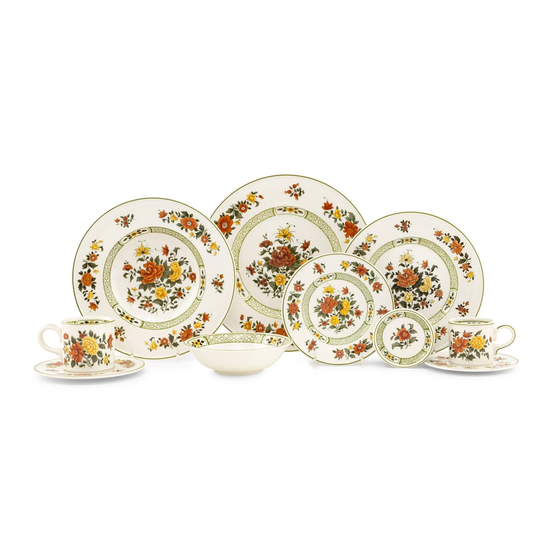 A Villeroy and Boch Porcelain Dinner Service: A Villeroy and Boch Porcelain Dinner Service Late 20th Century Summer Day pattern, comprising: 18 dinner plates 20 salad plates 12 entree bowls 16 bread and butter plates 8 butter pats 7 fruit bowls 1