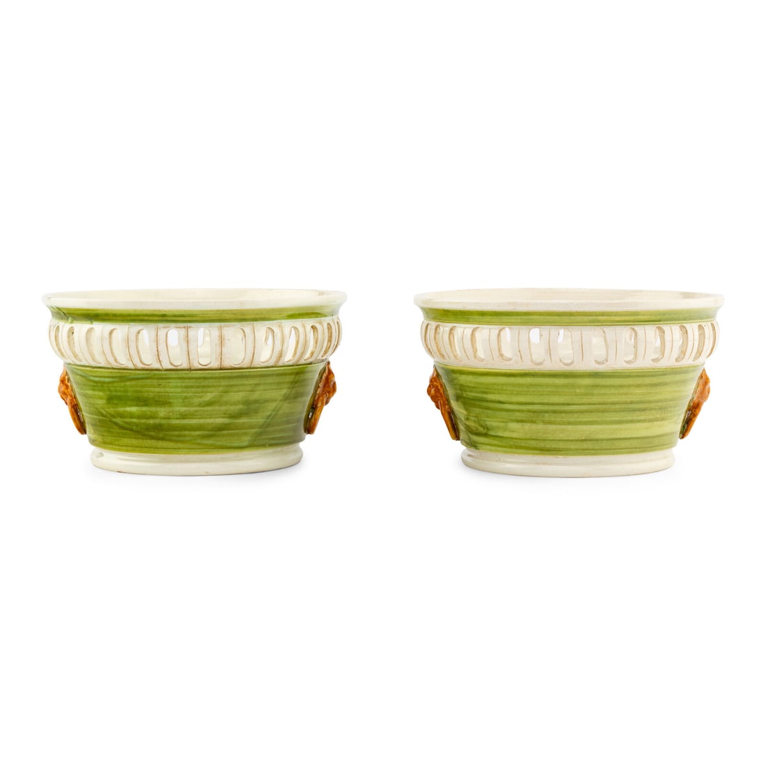 A Pair of Italian Earthenware Jardinieres: A Pair of Italian Earthenware Jardinieres 20th Century Height 5 1/2 x diameter 9 1/2 inches. Property from Strawberry Hill: The Collection of Ada and Barrie Regan, Hillsborough, California This lot is