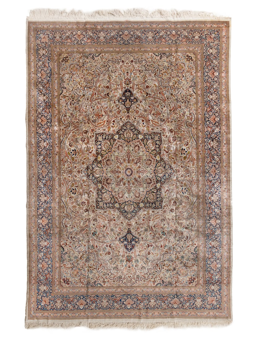 An Indian Silk Rug: An Indian Silk Rug 20th Century 9 feet 4 inches x 6 feet 7 inches. This lot is located in Chicago.