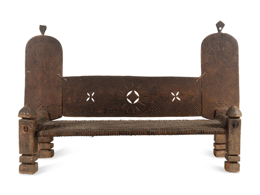 An Indian Teak Daybed: An Indian Teak Daybed 19th Century Height 63 x width 102 x depth 30 inches. This lot is located in Chicago.