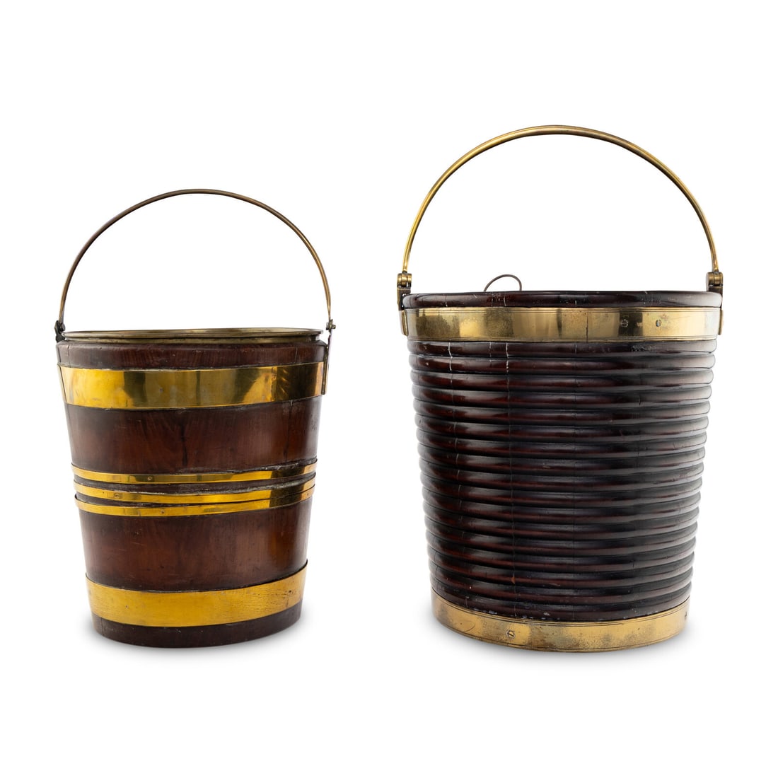 Two George III Brass Mounted Mahogany Peat Buckets: Two George III Brass Mounted Mahogany Peat Buckets 18th/19th century Height of larger example (to top of handle) 24 inches. Property from an Important Private Collection, Florida This lot is located i
