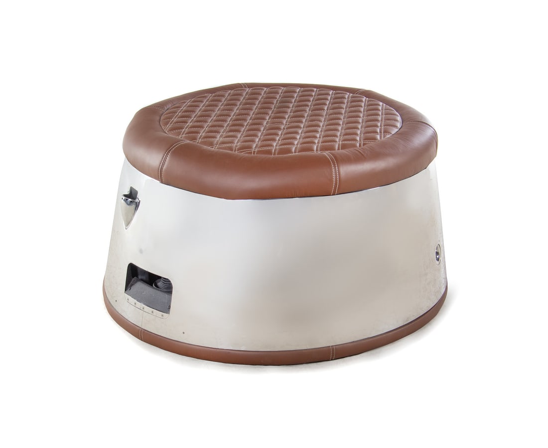 A Polished Aluminum "Aviator" Ottoman (1 of 2)