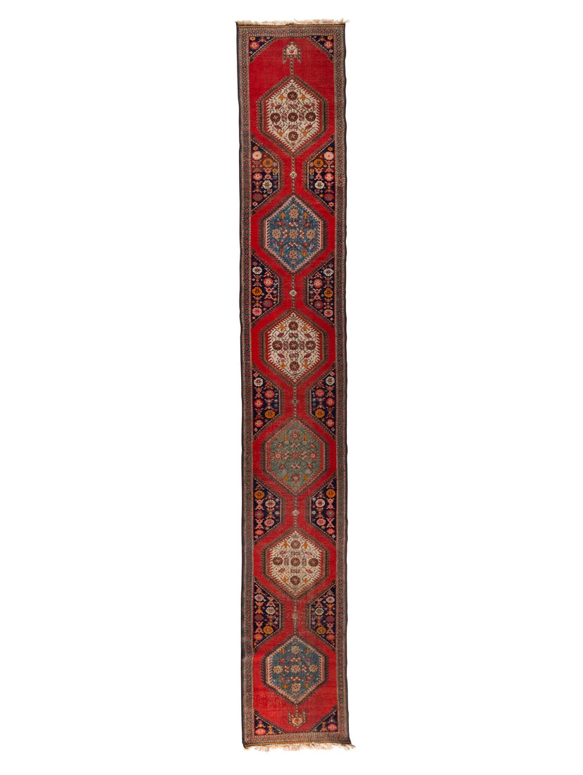 A Northwest Persian Wool Runner: A Northwest Persian Wool Runner Early 20th Century 17 feet 9 inches x 2 feet 5 inches. This lot is located in Chicago. Provenance Every lot in Sale 6571 - The Vault is being offered as-is and without 