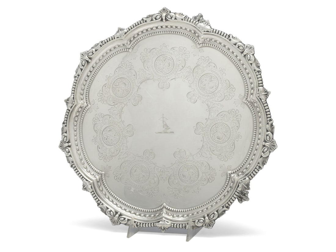 An Edwardian Armorial Engraved Silver Salver: An Edwardian Armorial Engraved Silver Salver William Gibson & John Lawrence Langman, Goldsmiths & Silversmiths Co, London,1898 hallmarked for sterling to underside 39 ozt 11 dwt Height 1 1/2 x