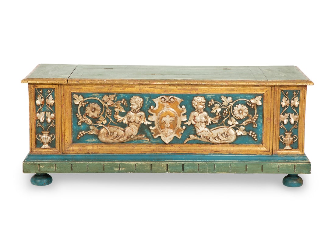 An Italian Parcel Gilt, Silvered and Polychrome Painted Cassone: An Italian Parcel Gilt, Silvered and Polychrome Painted Cassone 19th Century Height 21 x width 52 1/2 x depth 18 1/2 inches. This lot is located in Chicago. Provenance Every lot in Sale 6571 - The Vau