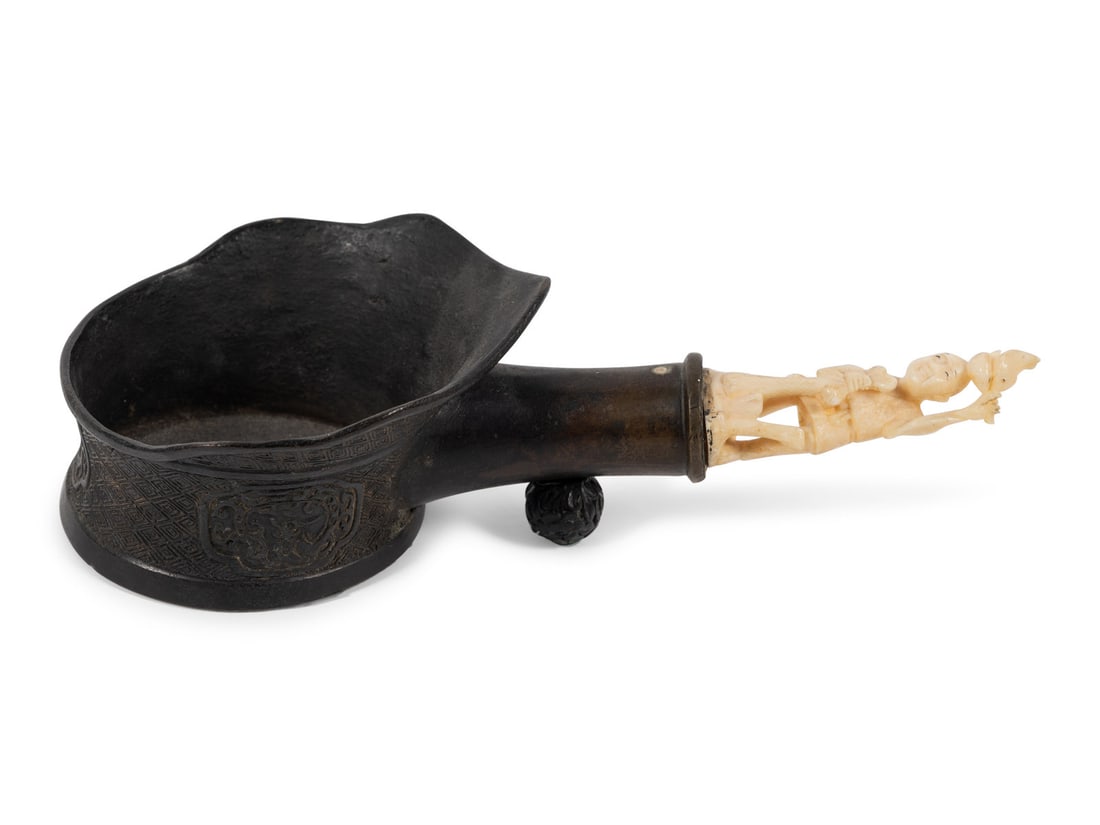 A Chinese Silk Iron with a Figural Handle (1 of 5)
