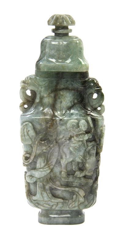 A Carved Hardstone Lidded Vessel, Height overall 8: A Carved Hardstone Lidded Vessel, of mottled green stone, having florally carved knop to the bell-form lid, the vessel with double handles and figural carving in relief, raised on a pedestal foot. Hei