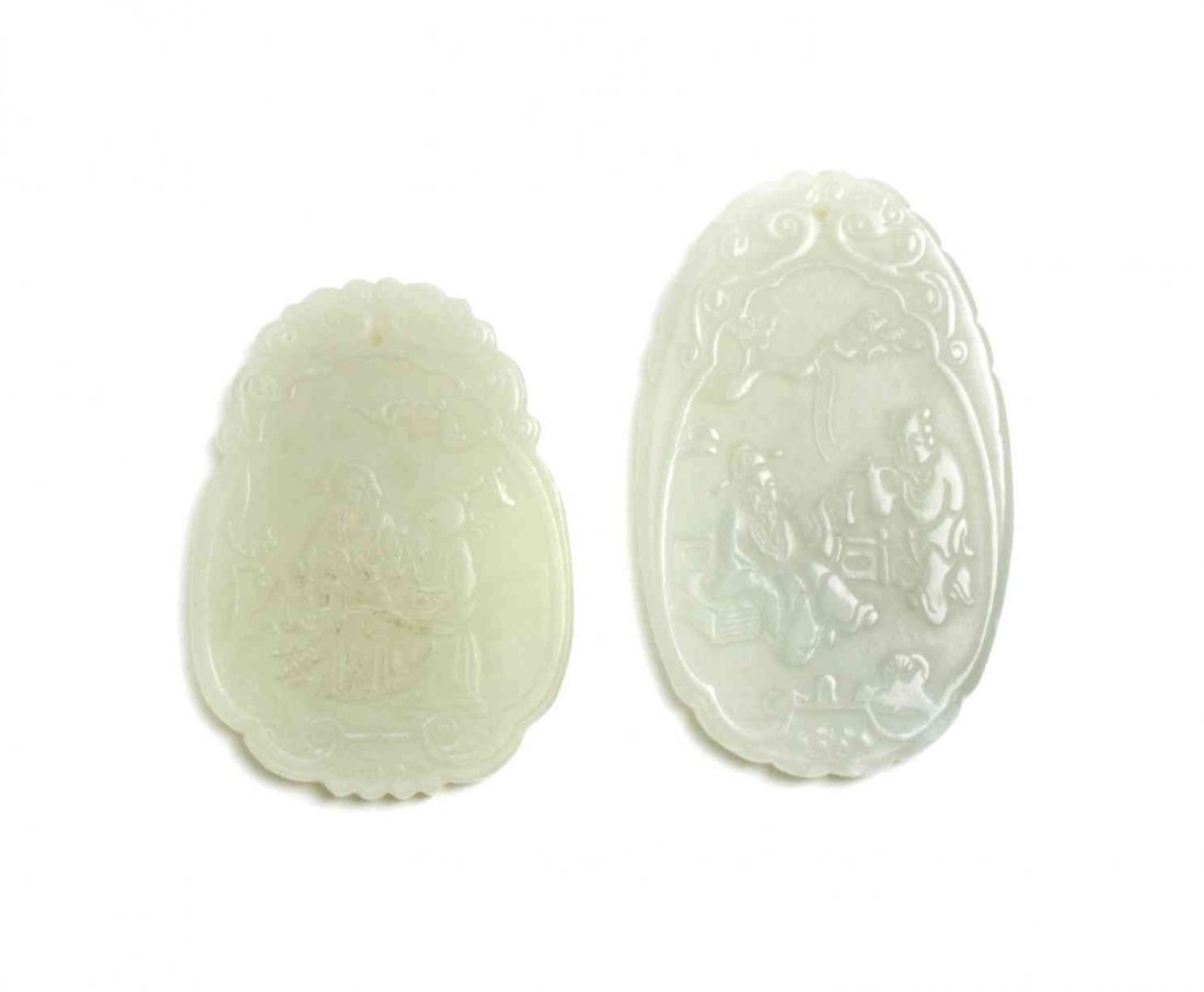 Two Celadon Jade Plaques, Height 2 7/8 inches.: Two Celadon Jade Plaques, each of oval form, centered with figural scenes. Height 2 7/8 inches.
