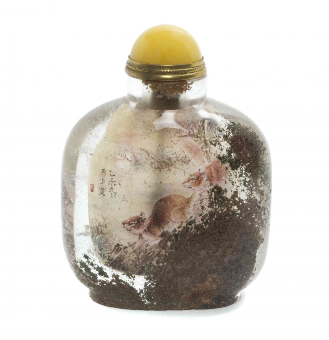 An Interior Painted Rock Crystal Snuff Bottle, Height 2: An Interior Painted Rock Crystal Snuff Bottle, depicting squirrels. Height 2 3/8 inches.