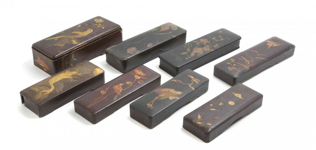 A Group of Eight Japanese Lacquered Boxes, Length of: A Group of Eight Japanese Lacquered Boxes, of rectangular form, with varying polychrome decoration and gilt accents. Length of longest 12 1/16 inches. Property from the Estate of Chrystian Aubusson de