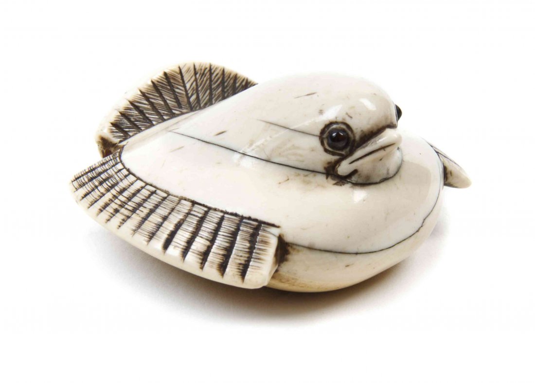 A Carved Ivory Bird Netsuke, Width 2 1/8 inches.: A Carved Ivory Bird Netsuke, depicting a rotund bird. Width 2 1/8 inches.