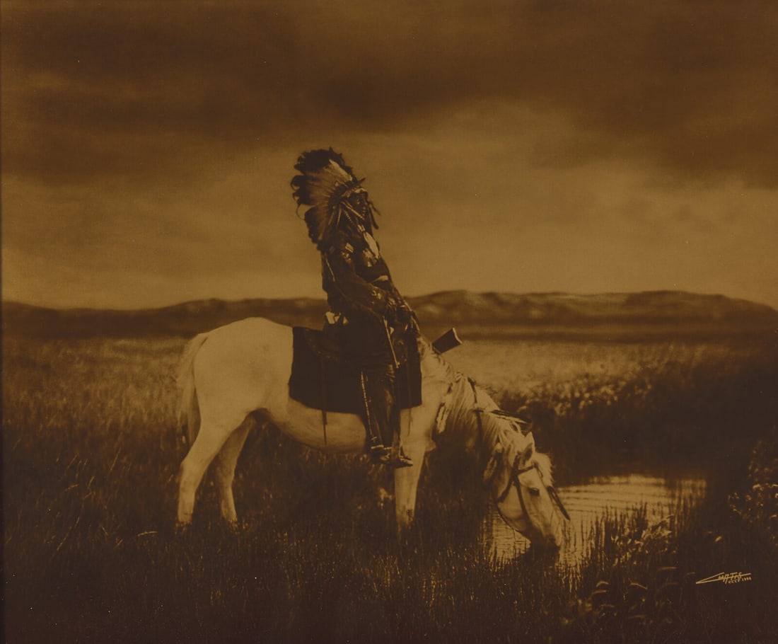 [Native-Americana] Curtis, Edward. An Oasis in the Badlands-Sioux: [Native-Americana] Curtis, Edward. An Oasis in the Badlands-Sioux (St. Paul, Minnesota): Christopher Cardoza Fine Art, 2005 (original negative, 1905). Signed in negative "Curtis CCP 1998". Goldtone ph