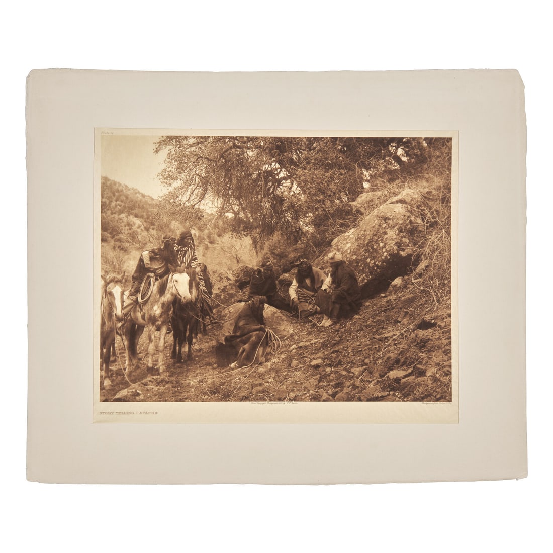 [Native-Americana] Curtis, Edward. Story Telling - Apache: [Native-Americana] Curtis, Edward. Story Telling - Apache No place: John Andrew & Son, 1908. Plate 11. Photogravure after Curtis on Japanese gampi tissue mounted on Rives BFK. 11 3/4 x 15 1/2 in. 
