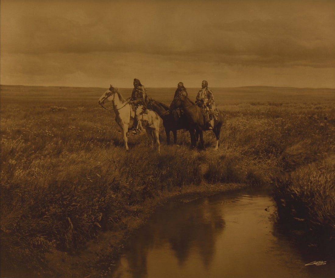 [Native-Americana] Curtis, Edward. Three Chiefs-Piegan: [Native-Americana] Curtis, Edward. Three Chiefs-Piegan (St. Paul, Minnesota): Christopher Cardoza Fine Art, 1999 (original negative, 1900). Signed in negative "Curtis CCP 1998". Goldtone photograph. C