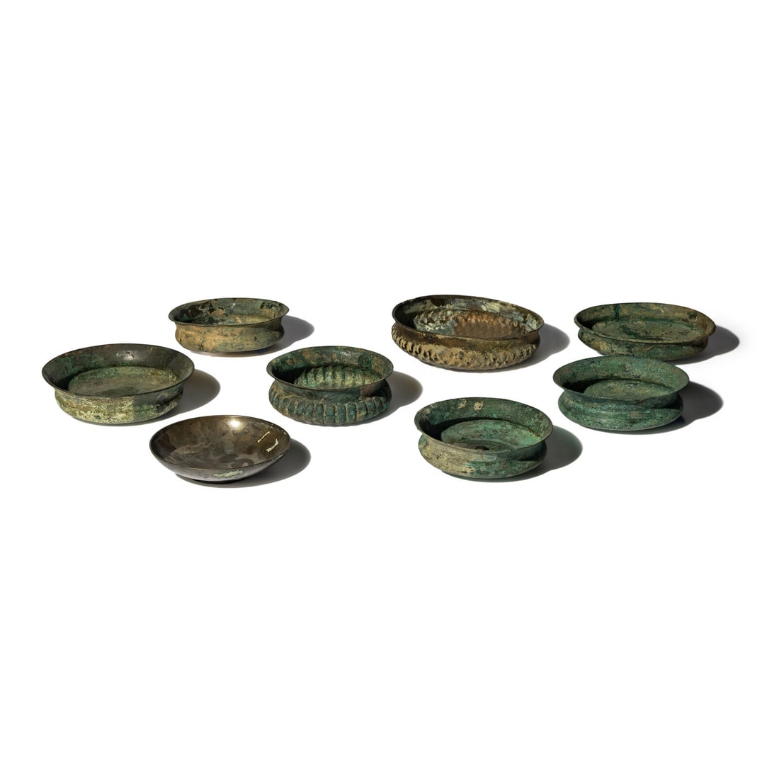 Eight Greco-Roman Bronze Bowls: Eight Greco-Roman Bronze Bowls Circa 4th Century B.C.-3rd Century A.D. Diameter of largest 17 cm (6 3/4 inches). Property from a California Private Collection This lot is located in Chicago. Provenanc