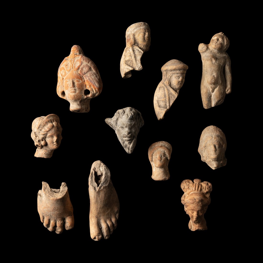 Eleven Hellenistic and Roman Terracotta Figure and Foot Fragments (1 of 2)