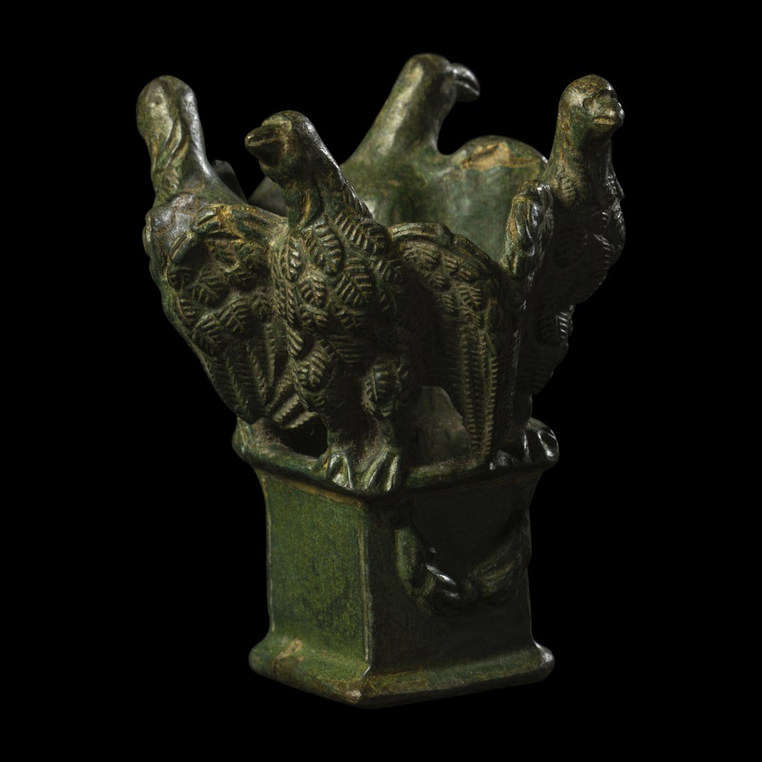 A Roman Bronze Lamp Stand with Four Eagles: A Roman Bronze Lamp Stand with Four Eagles Circa 1st-2nd Century A.D. Height 7 cm (2 3/4 inches). Property from the Collection of Mr. Felix Brejente, Schaumburg, Illinois This lot is located in Chicag