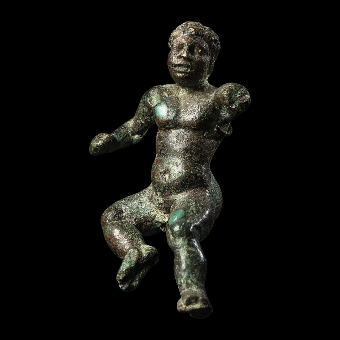A Roman Bronze Boy: A Roman Bronze Boy Height 9.7 cm (3 7/8 inches). This lot is located in Chicago. Provenance:Sotheby's, New York, Antiquities and Islamic Art, 24-25 November 1987, Lot 163. Sotheby's, New York, Antiqui