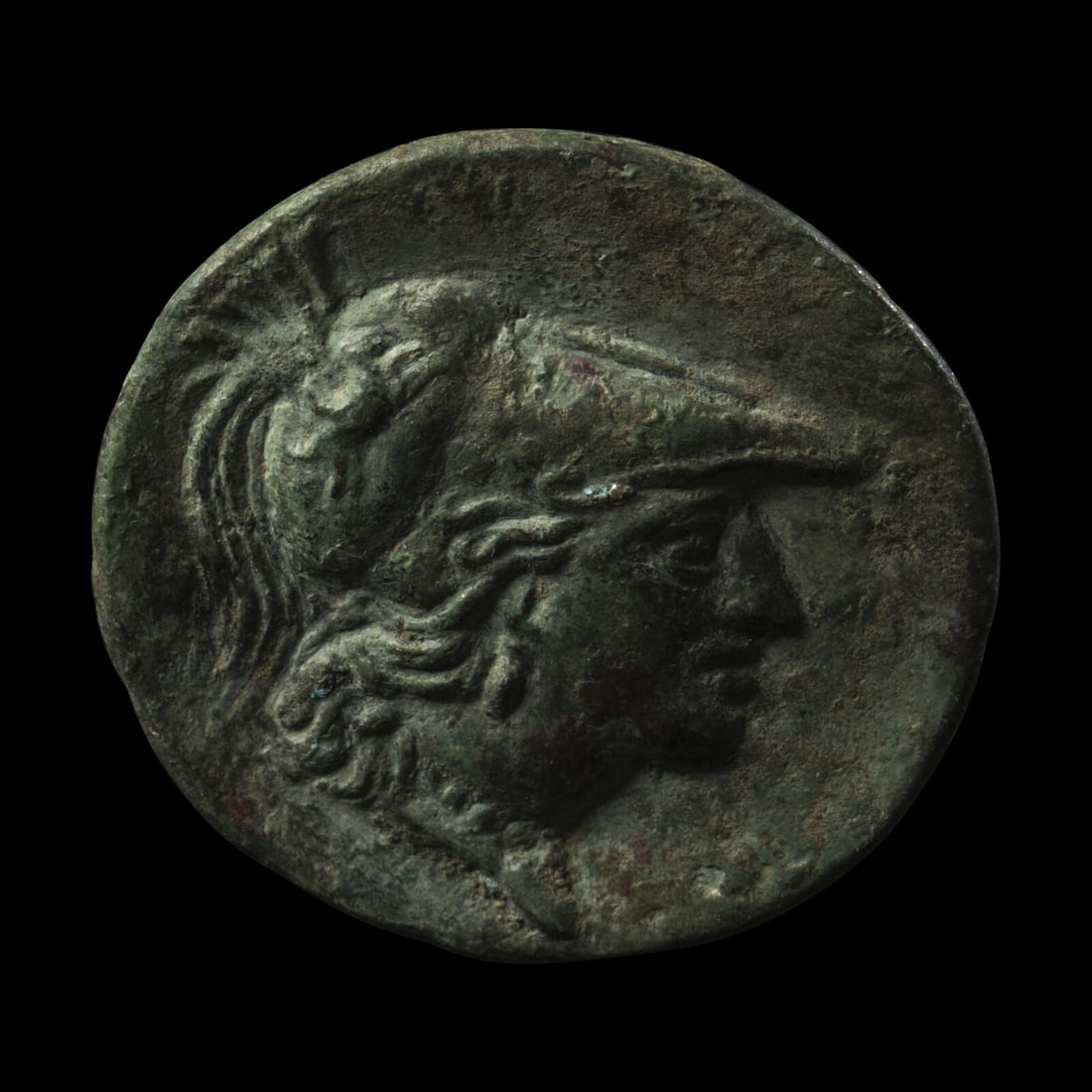 A Roman Bronze Fibula with Minerva: A Roman Bronze Fibula with Minerva Circa 1st-2nd Century A.D. Diameter 3.1 cm (1 1/4 inches). Property from the Collection of Mr. Felix Brejente, Schaumburg, Illinois This lot is located in Chicago. P