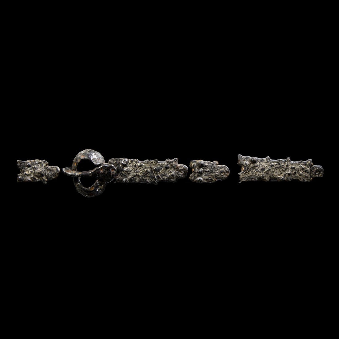 Five Migration Period Iron and Silver Belt Attachments