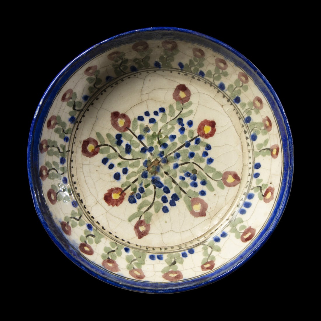 An Iznik Glazed Ceramic Dish: An Iznik Glazed Ceramic Dish Circa 16th-17th Century A.D. or Later Diameter 22.7 cm (8 7/8 inches). This lot is located in Chicago. Provenance: David B. Lawall (d. 2025) Collection, former Director an