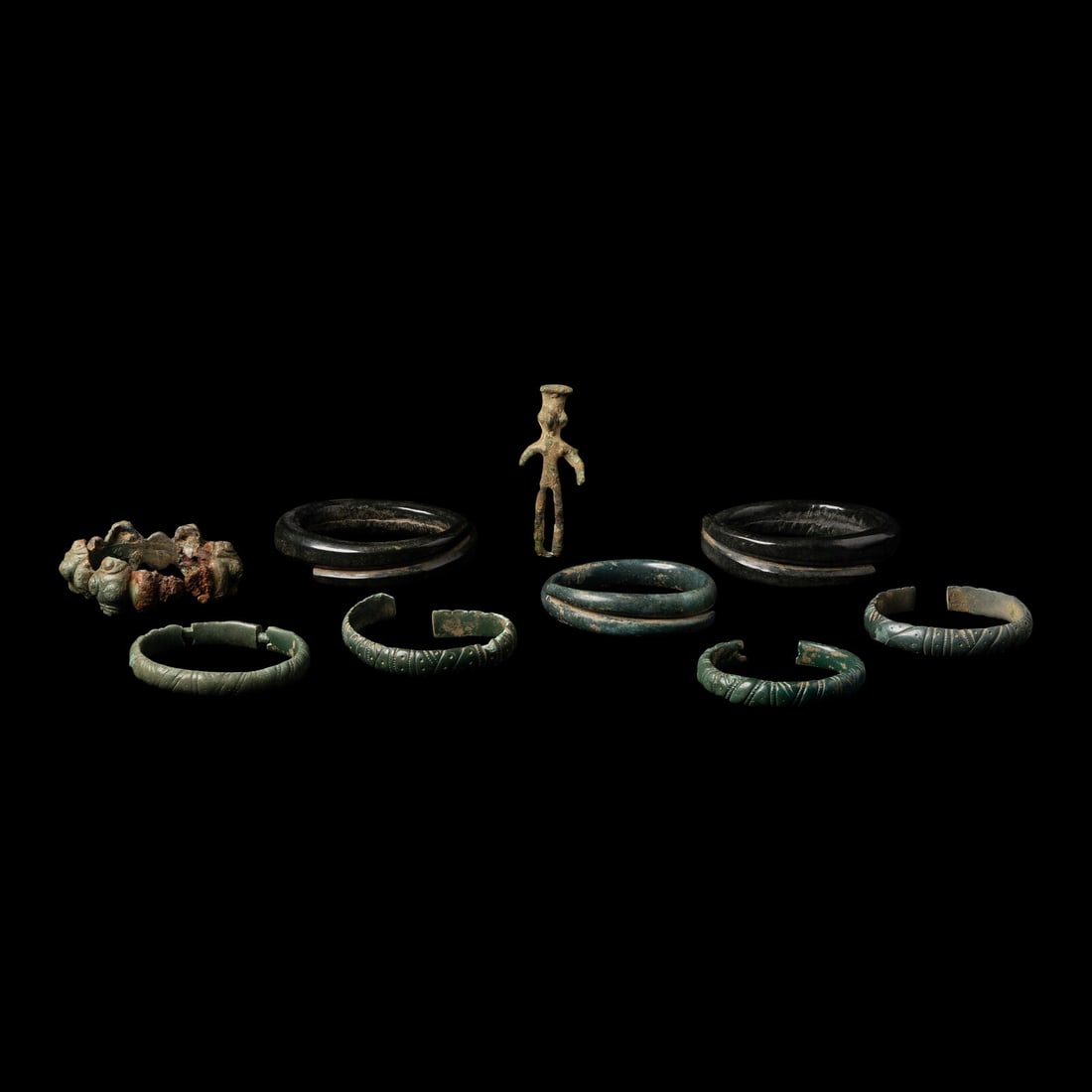 Eight European Bronze Armlets, Bracelets and a Figure (1 of 2)