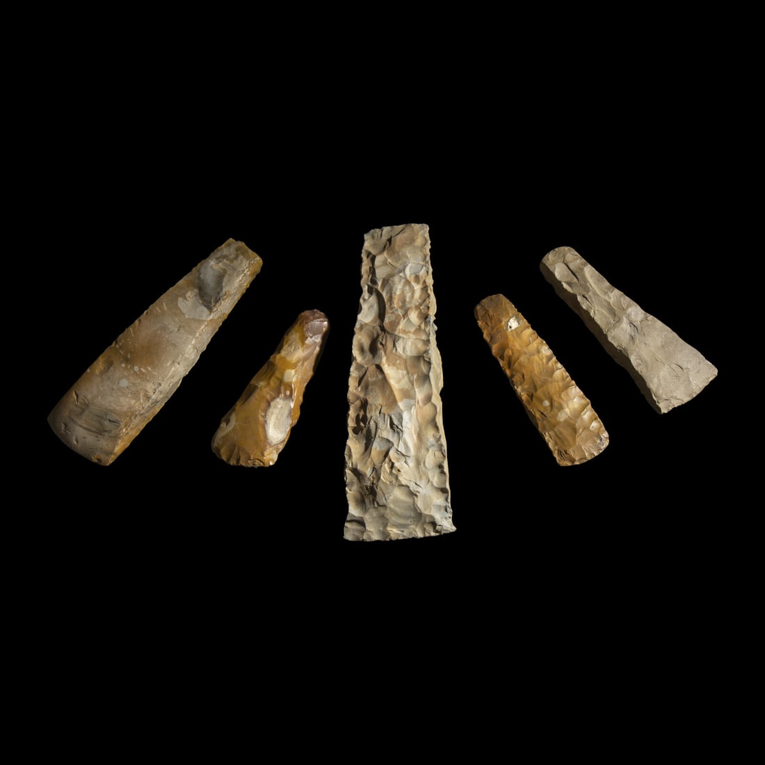 Five Neolithic Flint Thin and Square-Butted Axes: Five Neolithic Flint Thin and Square-Butted Axes Scandinavia, Circa 4000-2400 B.C. Length of largest 28 cm (11 inches). This lot is located in Chicago. Provenance: The Lawrence Sunde Collection