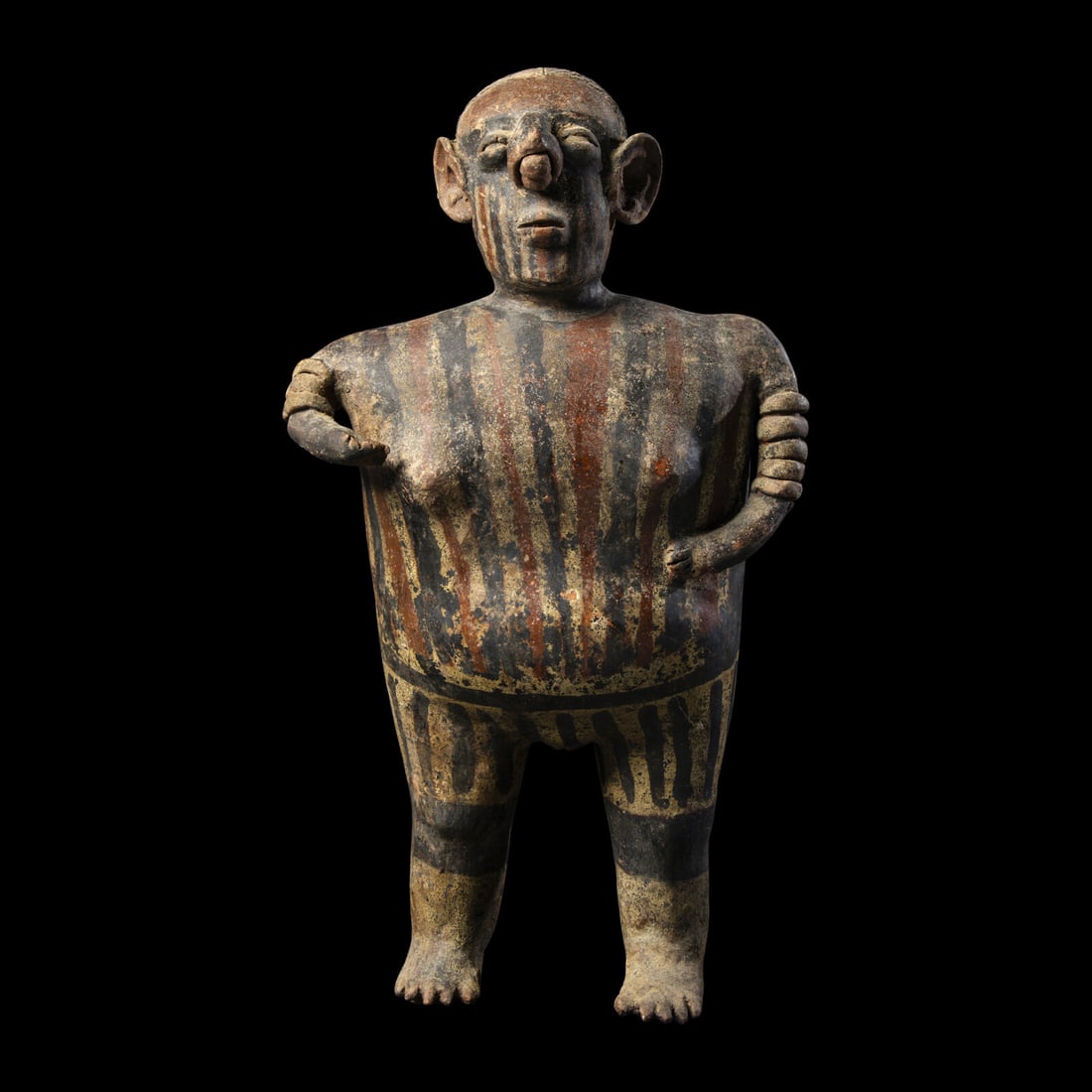 A Nayarit Terracotta Standing Figure: A Nayarit Terracotta Standing Figure West Mexico, Circa 1st Century B.C.-2nd Century A.D. Height 46.5 cm (18 1/4 inches). This lot is located in Chicago. Provenance: The Lands Beyond, New York. David