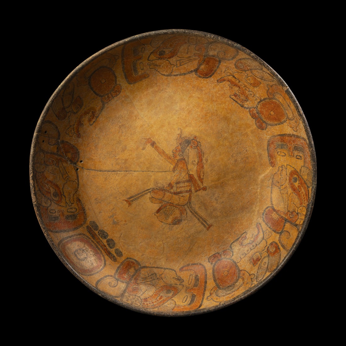 A Maya Polychrome Bowl: A Maya Polychrome Bowl Circa 600-900 A.D. Diameter 45 cm (17 11/16 inches). This lot is located in Chicago. Provenance: Robert and Marianne Huber, Dixon, Illinois. Andrew Langoussis, Rockford, Illinoi