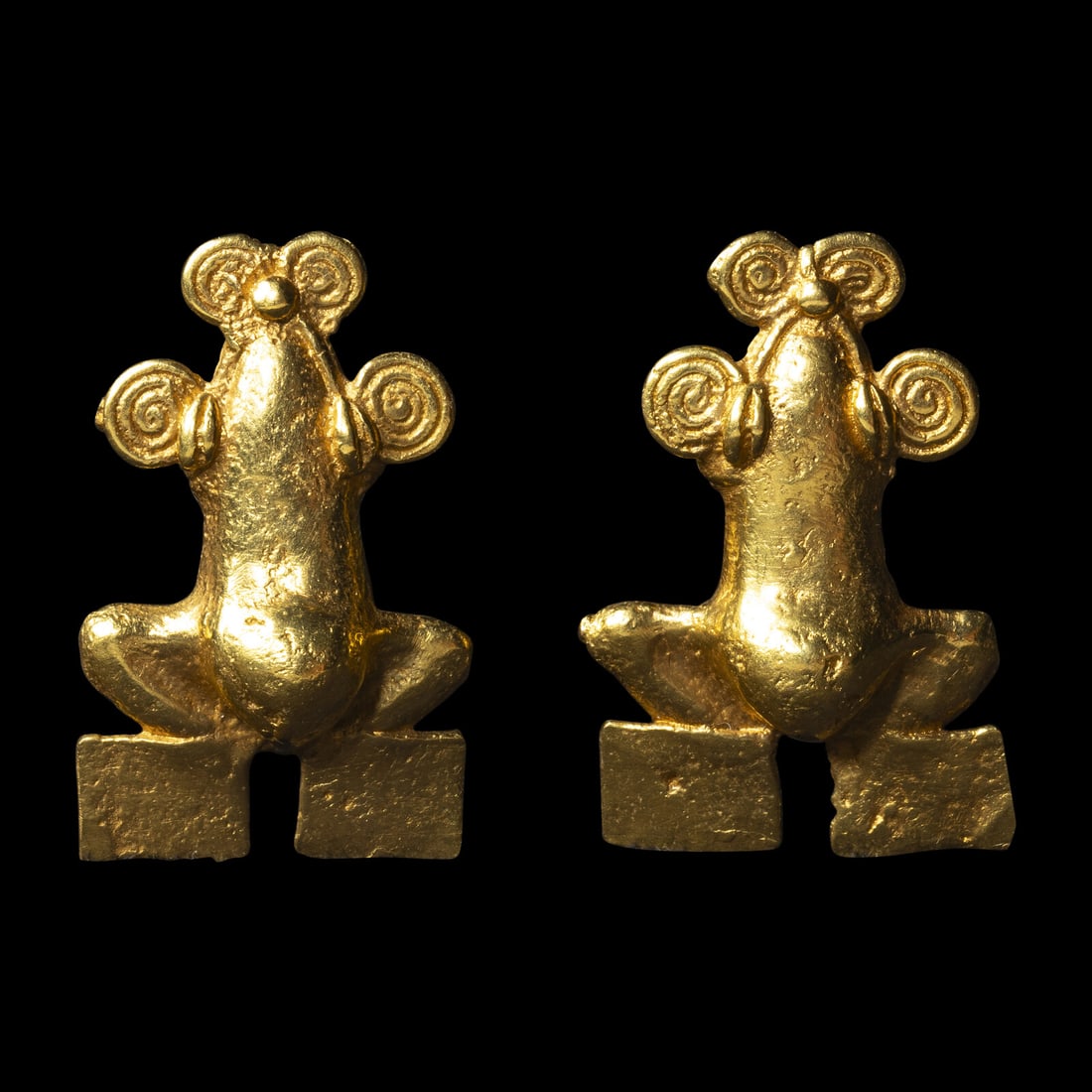 Two Veraguas Tumbaga Frog Pendants: Two Veraguas Tumbaga Frog Pendants Panama, Circa 1000-1550 A.D. Height 3.6 cm (1 3/8 inches). This lot is located in Chicago. Provenance: Jan Mitchell (former Trustee of the Metropolitan Museum of Art