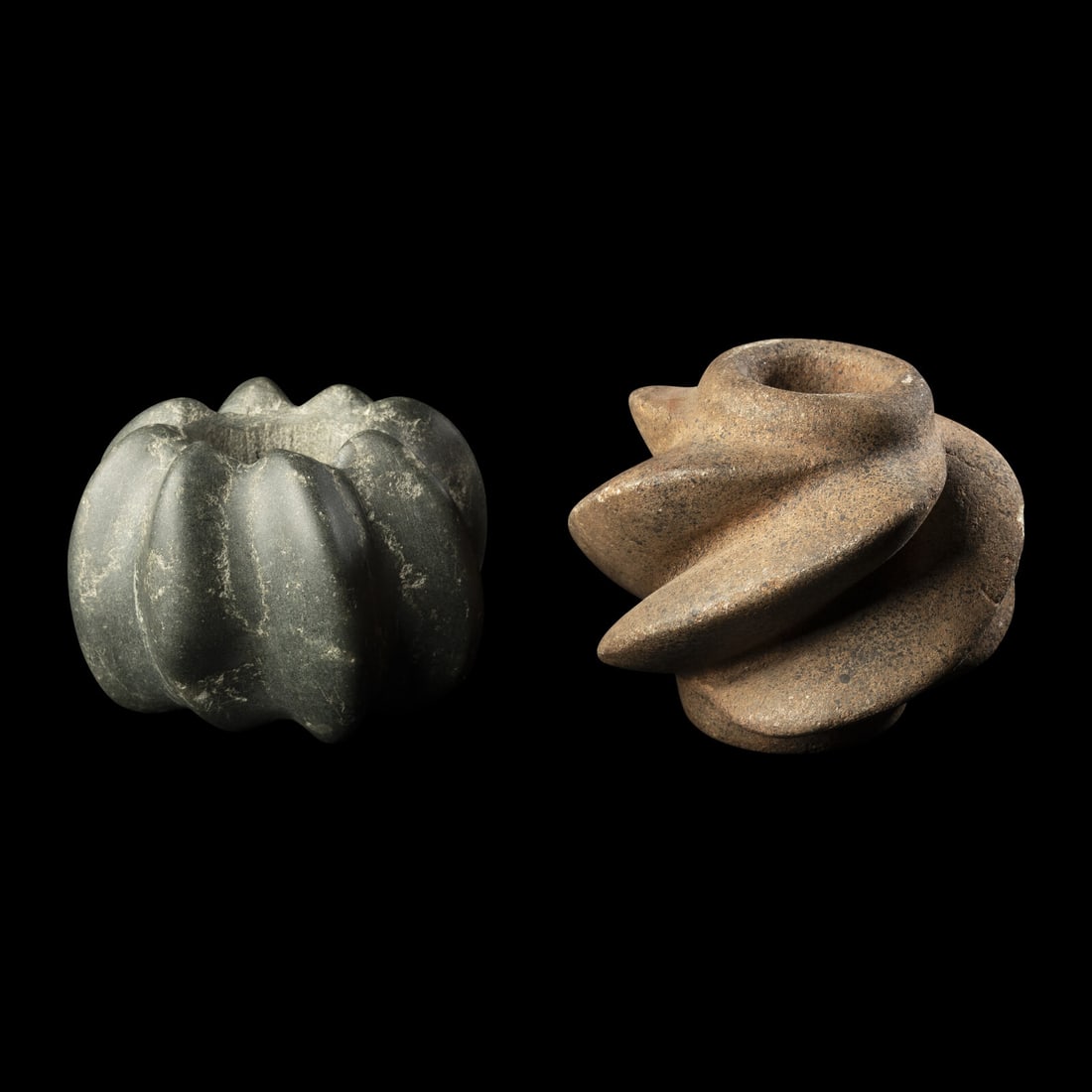 Two Chavin Stone Mace Heads: Two Chavin Stone Mace Heads Peru, Circa 4th Century B.C.-1st Century A.D. Length of largest 10.2 cm (4 inches). Property from a California Private Collection This lot is located in Chicago. Provenance