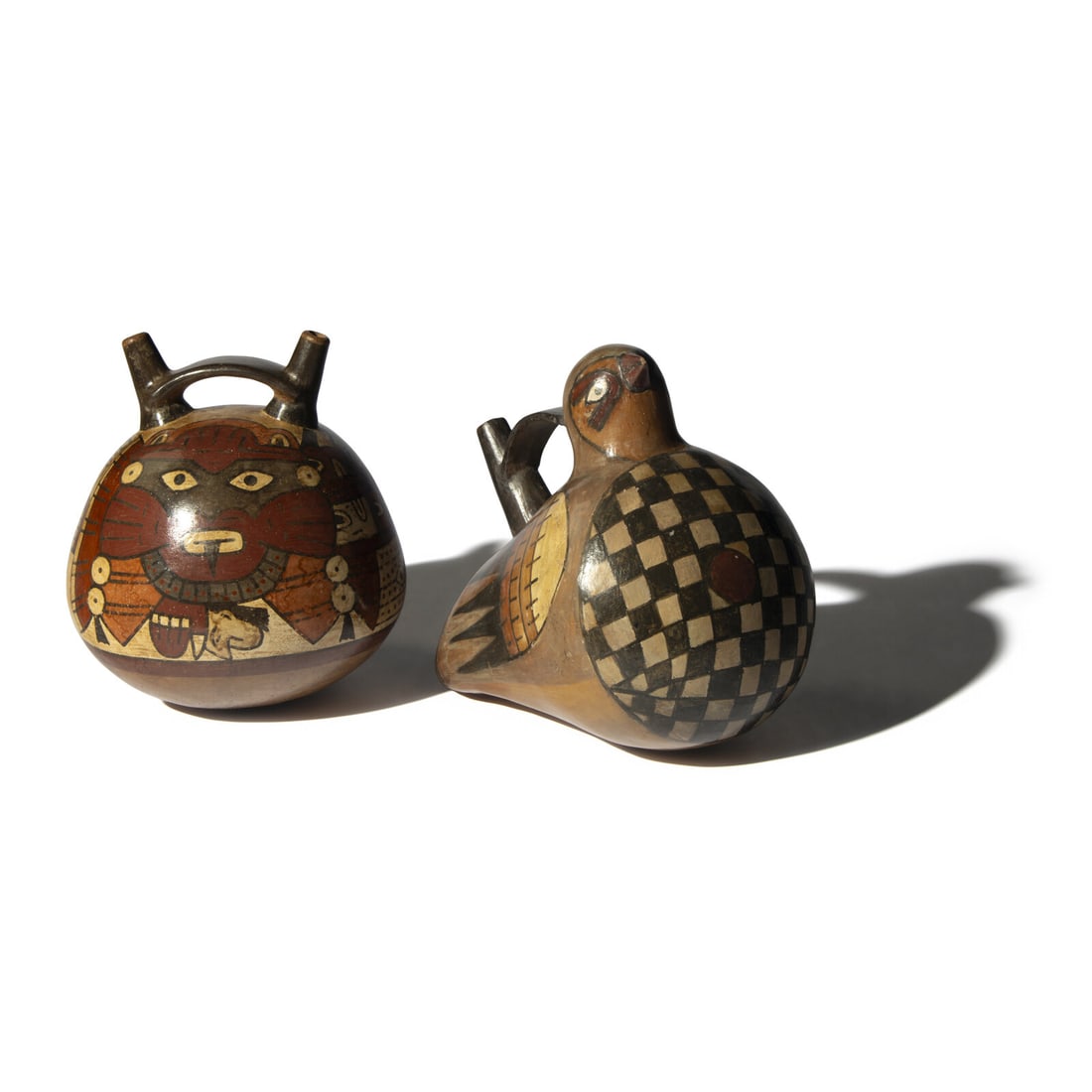Two Nazca Polychrome Vessels: Two Nazca Polychrome Vessels Peru, Circa 300 A.D. and Later Length of largest 19 cm (7 1/2 inches). Property from the Collection of Adolfo Schuetz, Doral, Florida. This lot is located in Chicago. Prov