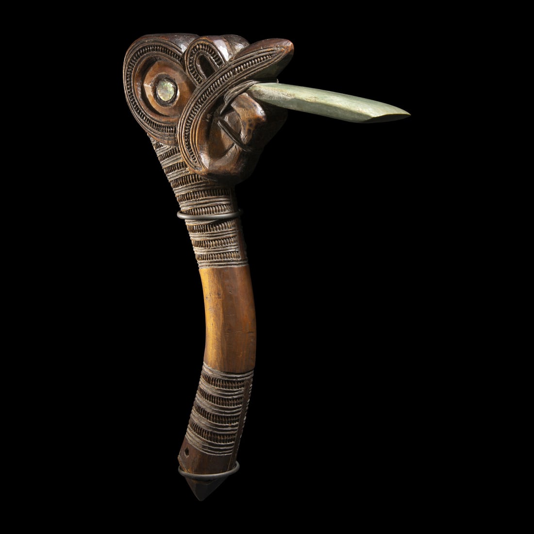 A Maori Wood Adze: A Maori Wood Adze New Zealand, Circa 19th Century A.D. Height 38.5 cm (15 3/16 inches). This lot is located in Chicago. Provenance: H.M. Lissauer, Melbourne, Australia. Andrew Langoussis, Rockford, Il