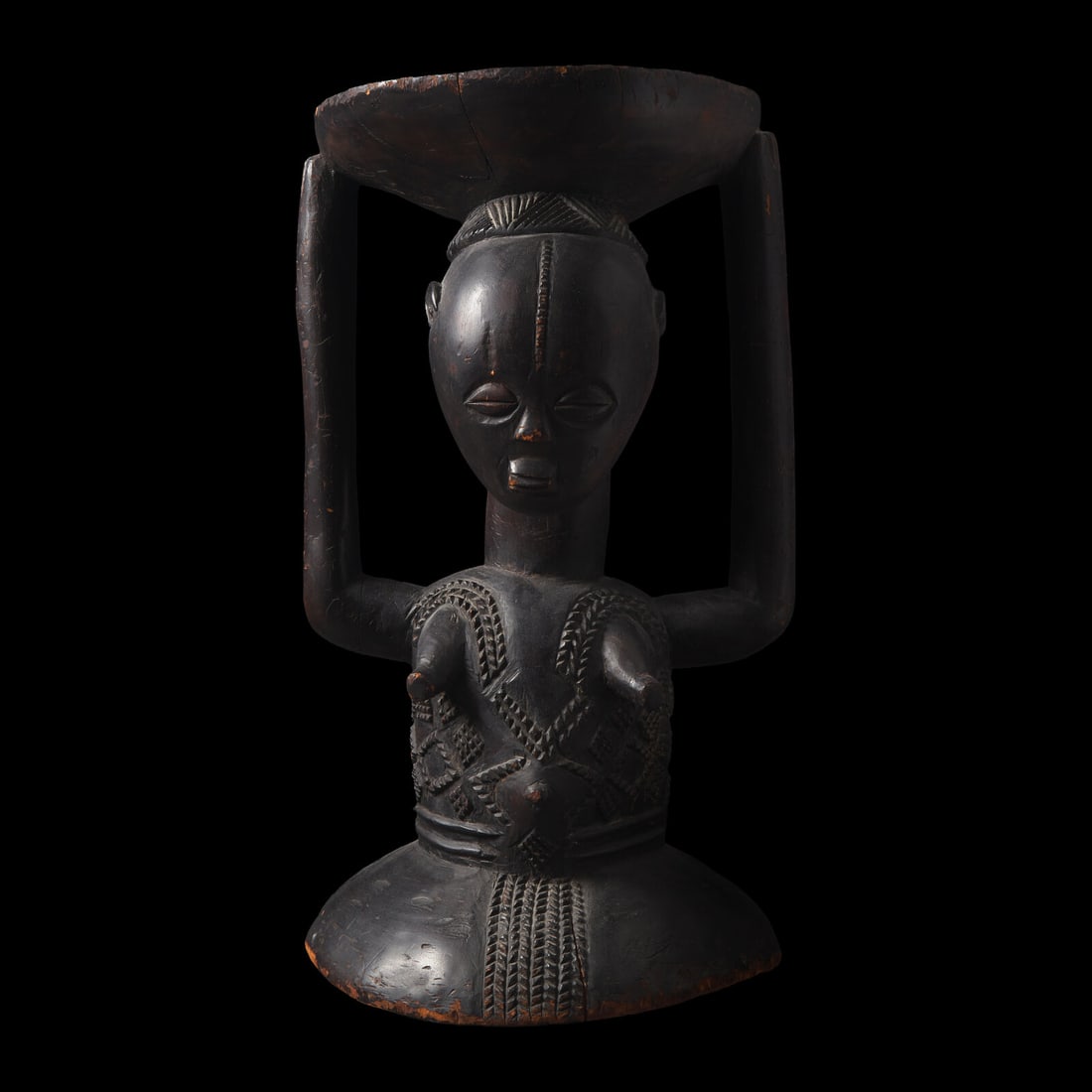 A Luba Wood Caryatid Stool: A Luba Wood Caryatid Stool Height 53 cm (20 7/8 inches). This lot is located in Philadelphia. Provenance: Helena Rubinstein (1872-1965), New York. Parke-Bernet Galleries, New York, 16 October 196
