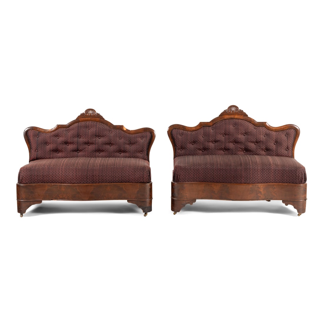 A Pair of Classical Veneered Mahogany and Upholstered Settees